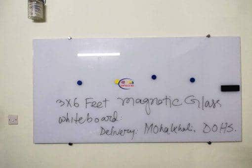 2 × 3 Feet Magnetic Glass Whiteboard Ultra White Frameless in modern workspace